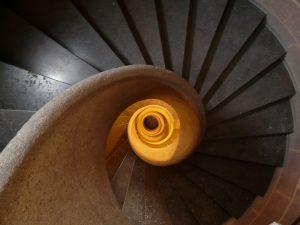 Image of downward spiralling staircase
